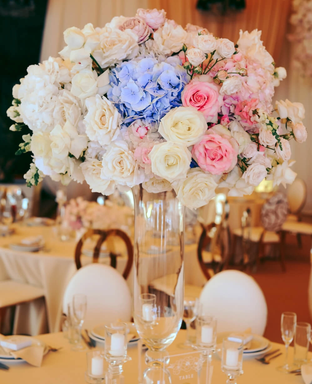 a vase of flowers on a table